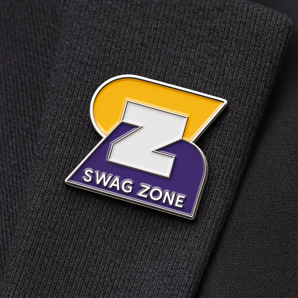 SwagZone enamel pin featuring a bold yellow and purple logo with "SWAG ZONE" text